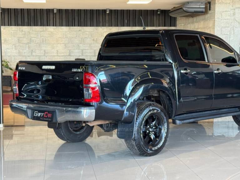 TOYOTA - HILUX - 2011/2012 - Preta - R$ 89.900,00