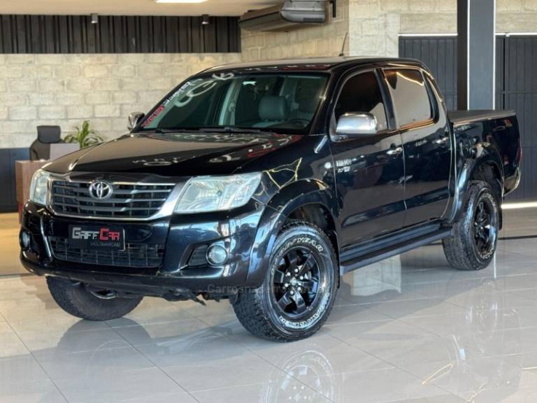 TOYOTA - HILUX - 2011/2012 - Preta - R$ 89.900,00