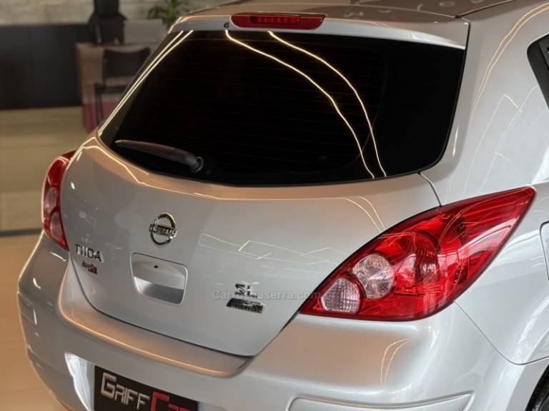 NISSAN - TIIDA - 2010/2011 - Prata - R$ 43.900,00