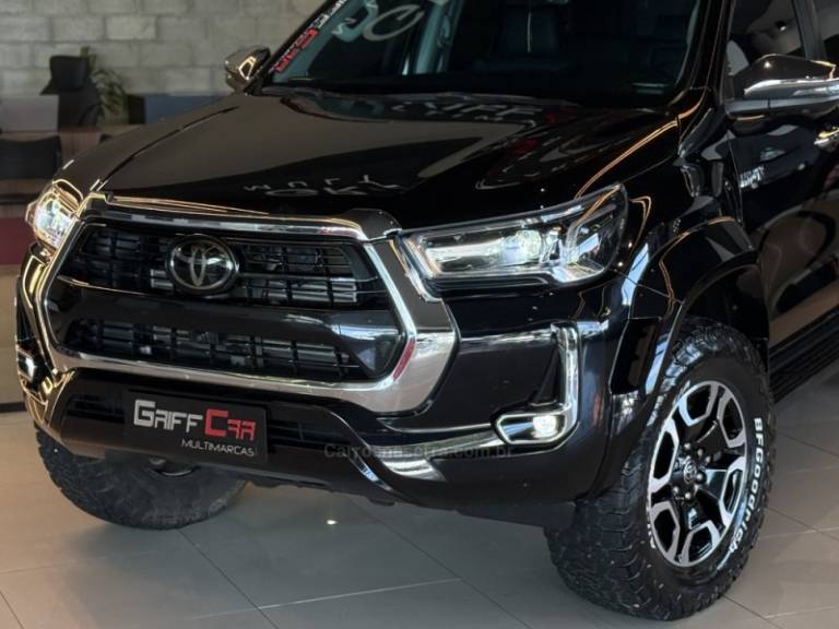 TOYOTA - HILUX - 2024/2024 - Preta - R$ 311.900,00