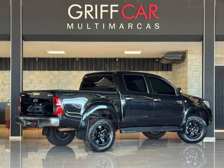 TOYOTA - HILUX - 2011/2012 - Preta - R$ 89.900,00
