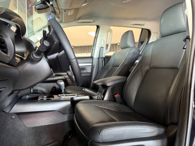 TOYOTA - HILUX - 2024/2024 - Preta - R$ 311.900,00