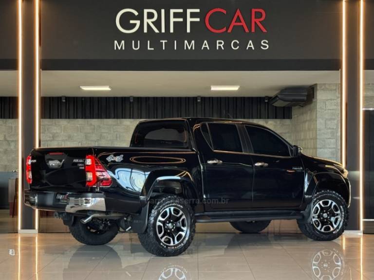 TOYOTA - HILUX - 2024/2024 - Preta - R$ 311.900,00