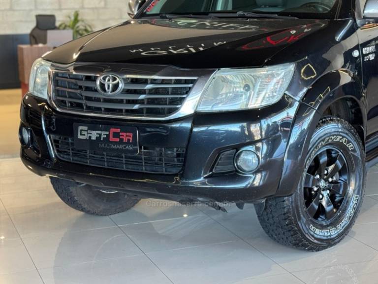 TOYOTA - HILUX - 2011/2012 - Preta - R$ 89.900,00