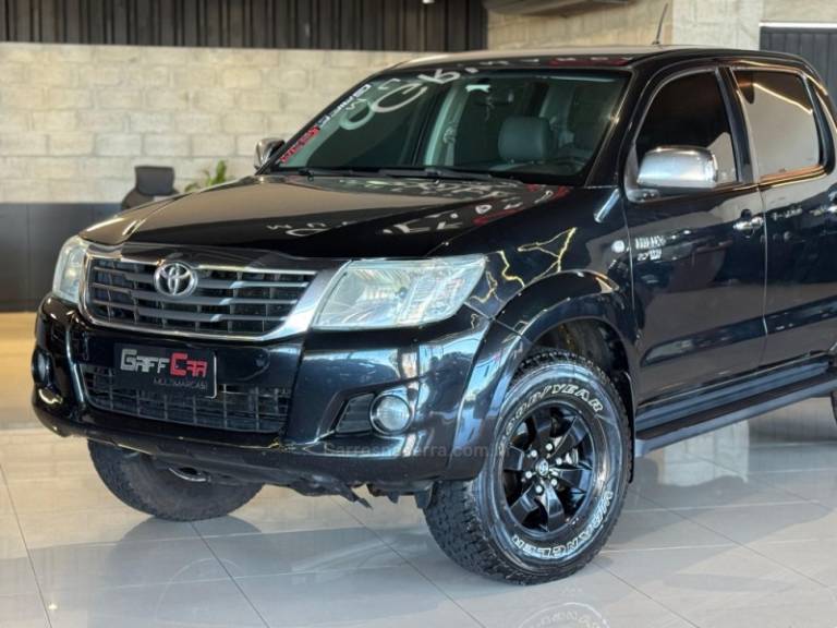 TOYOTA - HILUX - 2011/2012 - Preta - R$ 89.900,00